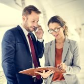 business-people-discussion-mobile-phone-telecommun-2025-02-10-13-24-57-utc (1)